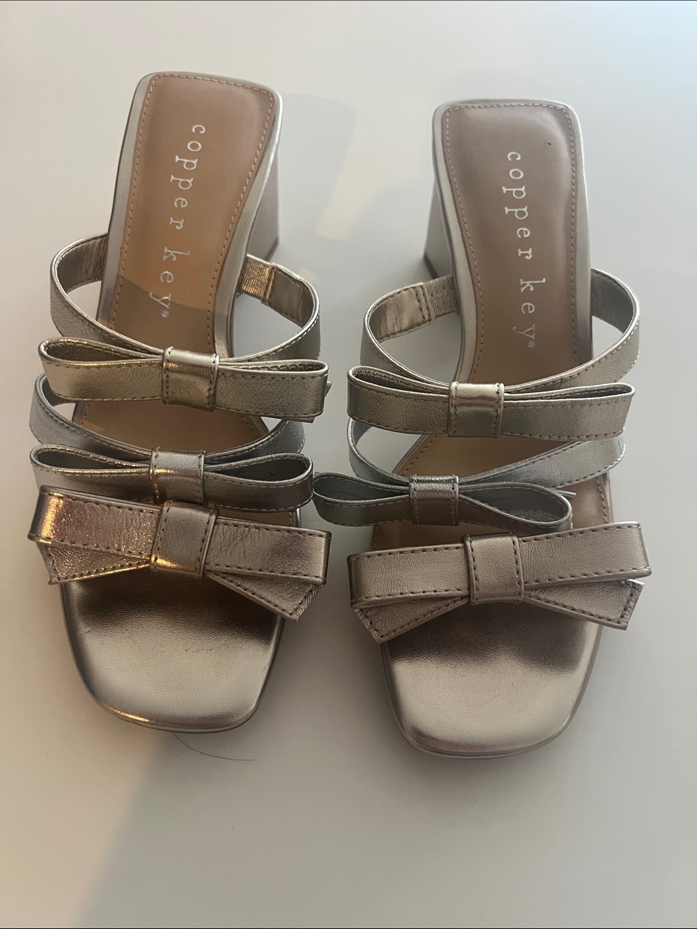Copper Key Silver Bow Block Heel Mules